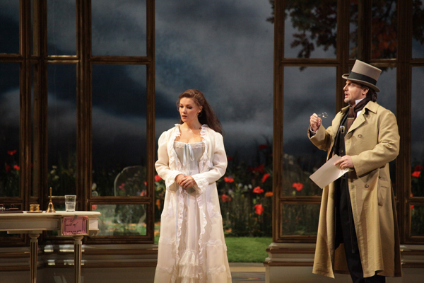 Oxana Shilova as Violetta.<br/> Igor Golovatenko as Giorgio Germont.<br/> Photo by Damir Yusupov.